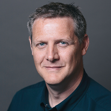 Headshot of Ian Reynolds