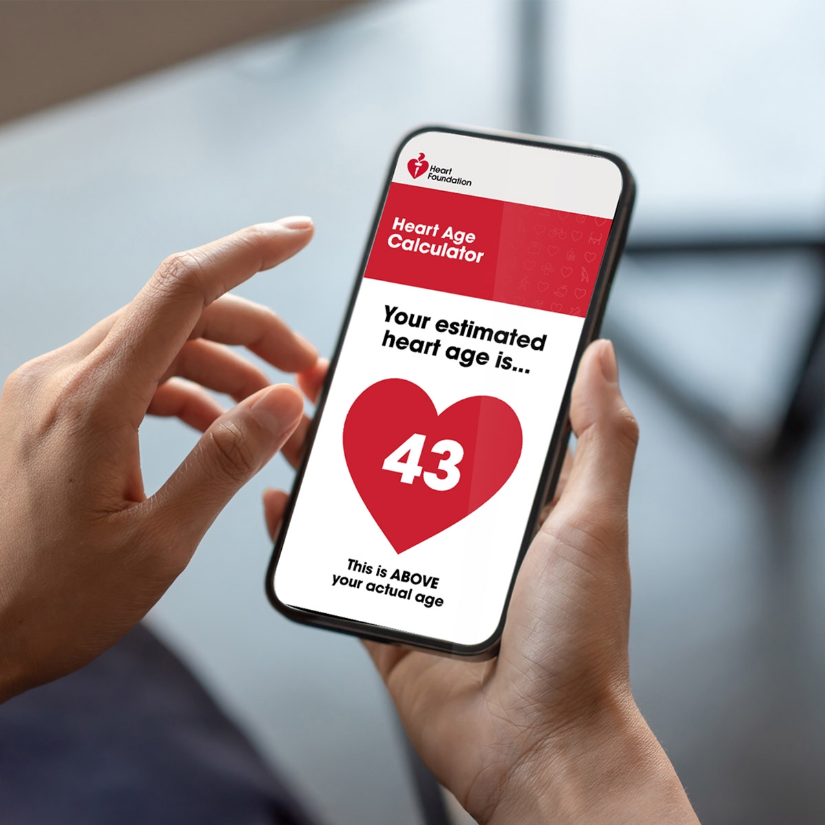 A person using the Heart Age Calculator on their phone